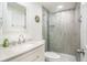 Modern bathroom with white vanity and glass shower at 11828 Bingham Dr, Port Richey, FL 34668