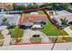 Aerial view of single Gathering home with pool and large yard at 1235 Cordova Ne Blvd, St Petersburg, FL 33704