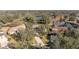 Aerial view of homes near a lake at 125 Falling Water Dr, Brandon, FL 33511