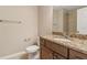 Bathroom with granite countertop, toilet and shower at 125 Falling Water Dr, Brandon, FL 33511