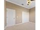 Bright bedroom with ceiling fan and double door closet at 125 Falling Water Dr, Brandon, FL 33511