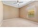 Spacious bedroom with ceiling fan and window blinds at 125 Falling Water Dr, Brandon, FL 33511