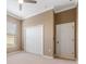 Bedroom with double door closet and ceiling fan at 125 Falling Water Dr, Brandon, FL 33511