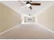 Large bedroom with ceiling fan and neutral color palette at 125 Falling Water Dr, Brandon, FL 33511