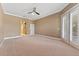Spacious bedroom with French doors leading to the backyard at 125 Falling Water Dr, Brandon, FL 33511