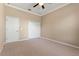 Spacious bedroom with ceiling fan and double door closet at 125 Falling Water Dr, Brandon, FL 33511