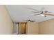 Bonus room with two ceiling fans and access to upstairs at 125 Falling Water Dr, Brandon, FL 33511
