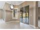 Bright dining area with sliding glass doors leading to a patio at 125 Falling Water Dr, Brandon, FL 33511