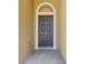 Front door entryway with arched window detail at 125 Falling Water Dr, Brandon, FL 33511