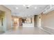 Open floor plan Gathering room with kitchen and staircase views at 125 Falling Water Dr, Brandon, FL 33511