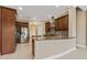 Large kitchen with curved island, stainless steel appliances, and ample counter space at 125 Falling Water Dr, Brandon, FL 33511
