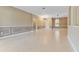 Spacious living room with tile floors and elegant chandelier at 125 Falling Water Dr, Brandon, FL 33511