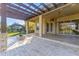 Covered patio with pergola, fire pit and outdoor kitchen at 125 Falling Water Dr, Brandon, FL 33511