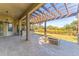 Large covered patio with pergola and outdoor kitchen at 125 Falling Water Dr, Brandon, FL 33511