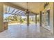 Covered patio with pergola, fire pit, and outdoor kitchen at 125 Falling Water Dr, Brandon, FL 33511