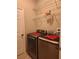 Laundry room with shelving and Samsung washer/dryer at 13504 Red Ear Ct, Riverview, FL 33569