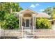 Charming bungalow with a white picket fence and lush landscaping at 1511 Prescott S St, St Petersburg, FL 33712