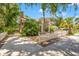 Home's exterior showcasing a driveway and appealing curb appeal at 1511 Prescott S St, St Petersburg, FL 33712