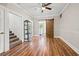 Hardwood floors and barn door separating rooms at 1511 Prescott S St, St Petersburg, FL 33712