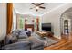Bright living room featuring hardwood floors and a cozy atmosphere at 1511 Prescott S St, St Petersburg, FL 33712