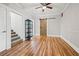 Bright living room featuring hardwood floors and a rustic barn door at 1511 Prescott S St, St Petersburg, FL 33712
