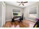 Home office with hardwood floors and built-in desk at 1511 Prescott S St, St Petersburg, FL 33712