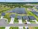 Houses with a pond in the community at 16120 67Th E Ct, Parrish, FL 34219