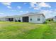 Screened patio and grassy backyard at 16120 67Th E Ct, Parrish, FL 34219