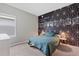 Charming bedroom featuring a unique wall design and comfortable bed at 16120 67Th E Ct, Parrish, FL 34219