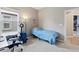 Small bedroom with a bed and workspace at 16120 67Th E Ct, Parrish, FL 34219