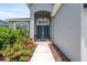 Attractive walkway leads to a home with a double door entry at 16120 67Th E Ct, Parrish, FL 34219