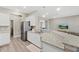Modern kitchen with stainless steel appliances and granite counters at 16120 67Th E Ct, Parrish, FL 34219