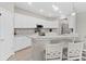 Modern kitchen with white cabinets and granite countertops at 16120 67Th E Ct, Parrish, FL 34219