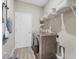 Laundry room with washer, dryer, and shelving at 16120 67Th E Ct, Parrish, FL 34219