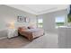 Spacious main bedroom with lake view and neutral decor at 16120 67Th E Ct, Parrish, FL 34219