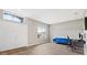 Home office with a blue sofa and a work desk at 16120 67Th E Ct, Parrish, FL 34219