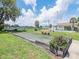 Community bocce ball court with benches and landscaping at 1652 S Lake Ave # 2, Clearwater, FL 33756