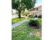 Well-maintained walkway with lush landscaping at 1652 S Lake Ave # 2, Clearwater, FL 33756