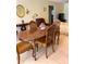 Elegant dining room features a wood table and comfortable seating at 1652 S Lake Ave # 2, Clearwater, FL 33756
