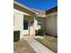 Inviting condo exterior with landscaped entryway and walkway at 1652 S Lake Ave # 2, Clearwater, FL 33756