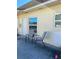 Private patio with two chairs, perfect for relaxing at 1652 S Lake Ave # 2, Clearwater, FL 33756