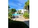 Relaxing pool area with lounge chairs and lush landscaping at 1652 S Lake Ave # 2, Clearwater, FL 33756