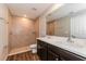 Bathroom with double vanity, shower, and toilet at 19474 Strathcona Ave, Port Charlotte, FL 33954