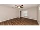 Bedroom with ceiling fan and window with blinds at 19474 Strathcona Ave, Port Charlotte, FL 33954