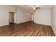 Spacious bedroom with wood flooring and ceiling fan at 19474 Strathcona Ave, Port Charlotte, FL 33954