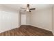 Bedroom with double closets and wood-look floors at 19474 Strathcona Ave, Port Charlotte, FL 33954