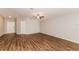 Spacious bedroom with wood flooring and ceiling fan at 19474 Strathcona Ave, Port Charlotte, FL 33954