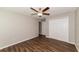 Bedroom with double closets and wood-look floors at 19474 Strathcona Ave, Port Charlotte, FL 33954