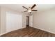 Bedroom with double closets and wood-look floors at 19474 Strathcona Ave, Port Charlotte, FL 33954