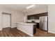 Modern kitchen with stainless steel appliances and island at 19474 Strathcona Ave, Port Charlotte, FL 33954